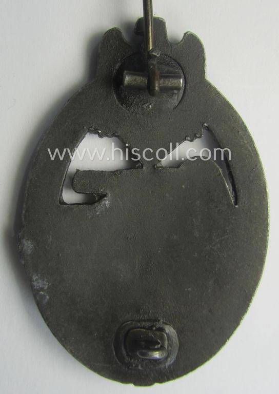 'Panzerkampfabzeichen in Bronze' (or: bronze-class panzer assault badge or PAB) being a zinc- (ie. 'Feinzink'-) version (of the so-called: 'early-period, hollow-zinc, Type A'-variant) as was procuced by the: 'Wilhelm Deumer'-company
