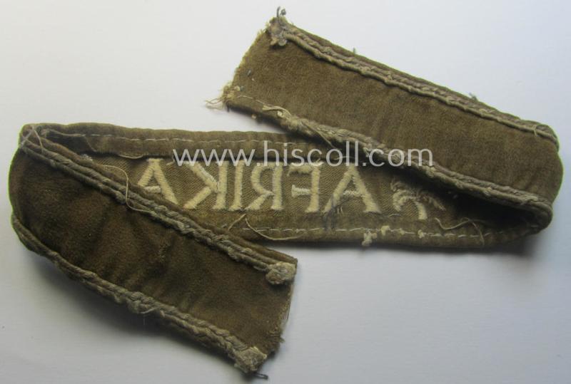Neat, WH cuff-title (ie. 'Ärmelstreifen') entitled: 'Afrika' that comes in a clearly issued, worn- and/or most certainly once tunic-attached, condition