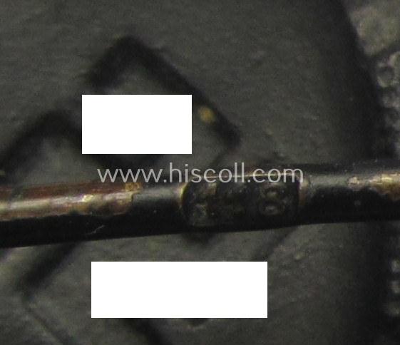 Neatly maker- (ie. '118'-) marked example of a black-class wound-badge (or: 'Verwundeten-Abzeichen in Schwarz') being an example that was produced by the (Austrian-based) maker (ie. 'Hersteller') named: 'August Menze & Sohn'