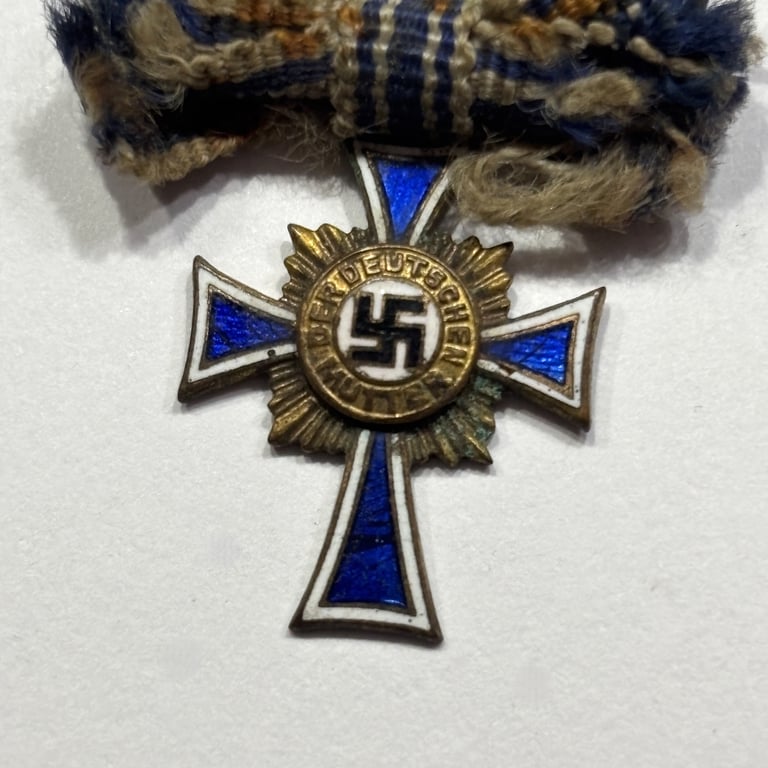 Miniature Mother's Cross in Bronze on Bow Ribbon