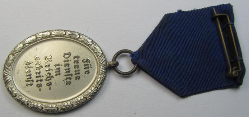 Attractive example of a: RAD (ie. 'Reichsarbeitsdienst') so-called: 'Dienstauszeichnung 3. Stufe für Männer' (as was intended for 12 years loyal-service) and that comes mounted on its period piece of ribbon (ie. 'Bandabschnitt')