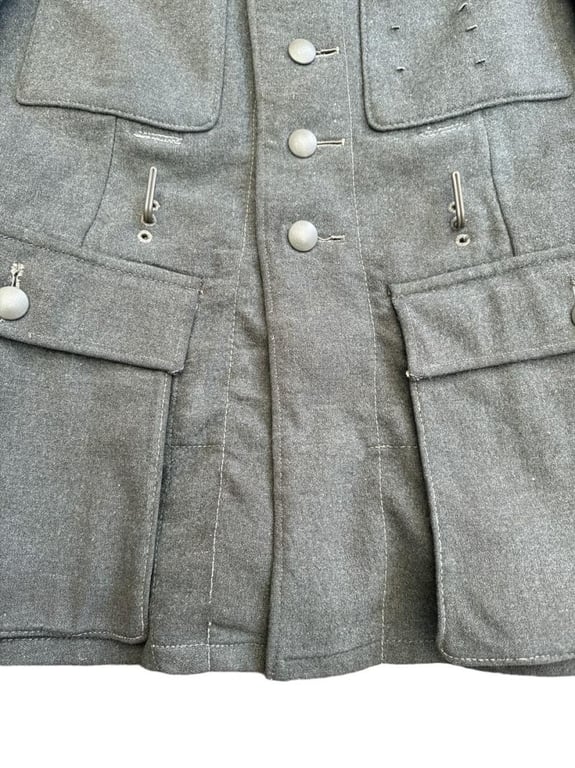 Wehrmacht Heer M43 EM field tunic With Original Applied Insignia