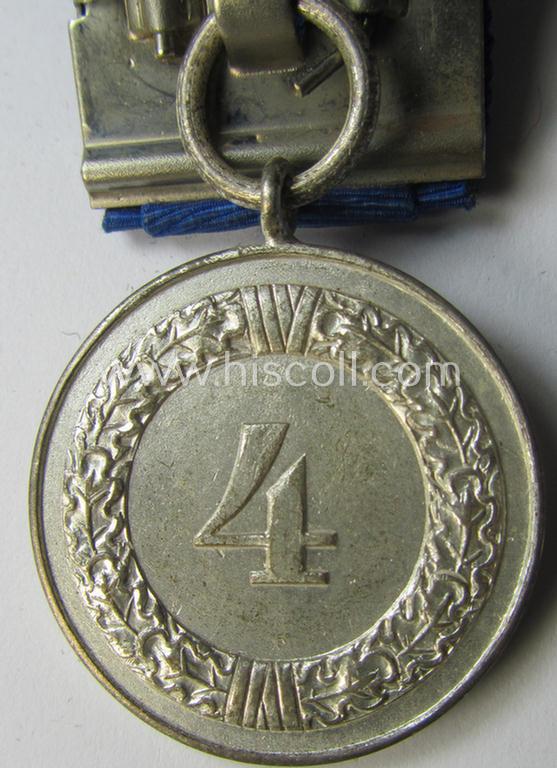 Attractive, silver-toned & detachable WH (Heeres o. KM) so-called: 'Einzelspange' showing a: 'WH-Dienstauszeichnung 4. Stufe' (as was intended for 4 years of loyal-service) and that shows a detailed, Heeres o. KM-type-eagle-device, period-attache...