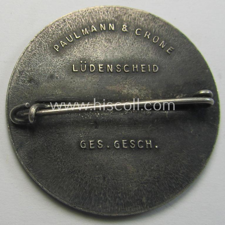 Commemorative, silvered 'Buntmetall'-based N.S.D.A.P.- (ie. WHW-) related 'tinnie' being a maker- (ie. 'Paulmann u. Crone'-) marked example depicting Adolf Hitler and showing the text: 'Hitler's Dank - Winterhilfe 1933-1934 - Gau Westfalen-No...