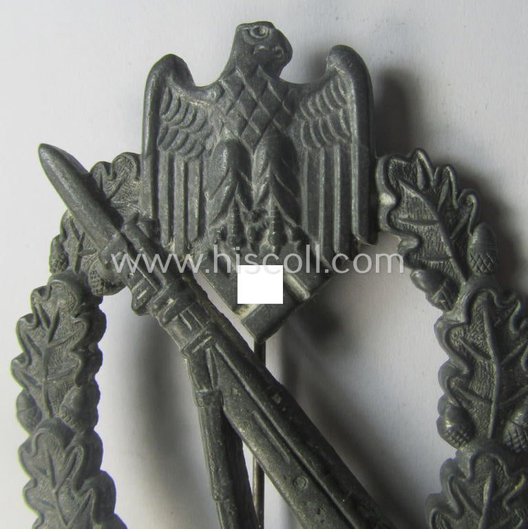 'Infanterie-Sturmabzeichen in Silber' (or: silver-class infantry-assault badge ie. IAB) being a neatly maker- (ie. 'MK 1'- or: 'Metall u. Kunststoff'-) marked example as executed in greyish-silverish-coloured 'Feinzink'