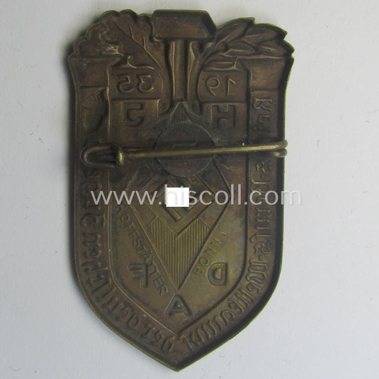 Commemorative, golden-bronze-toned, 'DAF'/'HJ'- (ie. 'Deutsches Arbeits Front o. Hitlerjugend'-) related 'tinnie' being a maker- (ie. 'Hofstätter'-) marked example depicting a: 'HJ-raute' and text: 'Reichs-Berufs-Wettkampf der deutschen Jugend 1935'