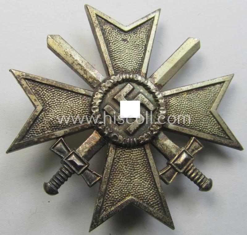 'Kriegsverdienstkreuz 1. Kl. mit Schwn.' being a maker- (ie. '4'-) marked and/or: 'Buntmetall'-based specimen by: 'Steinhauer & Lück'