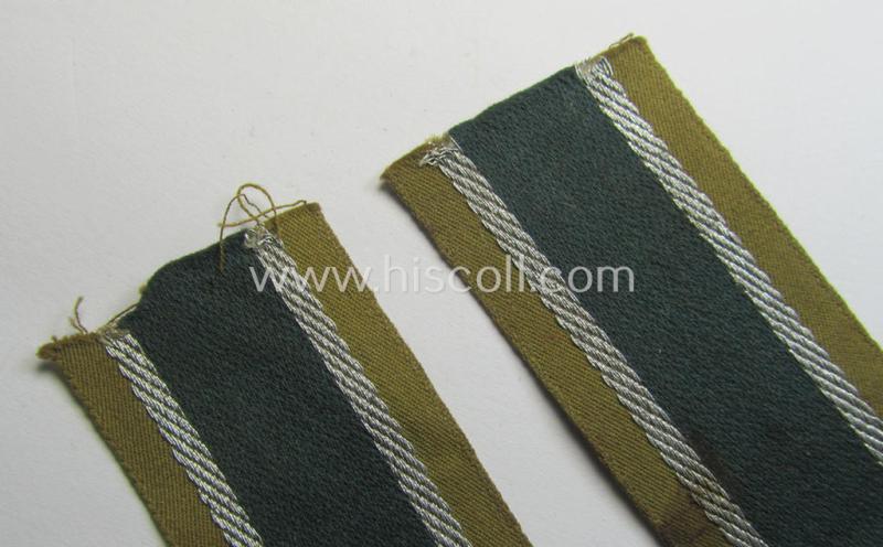 Superb, 'BeVo'-like cuff-title (ie. 'Ärmelstreifen') entitled: 'Afrikakorps' being a presumably issued but never worn example that comes in an overall very nice- (ie. non-shortened- and never tunic-attached-), condition