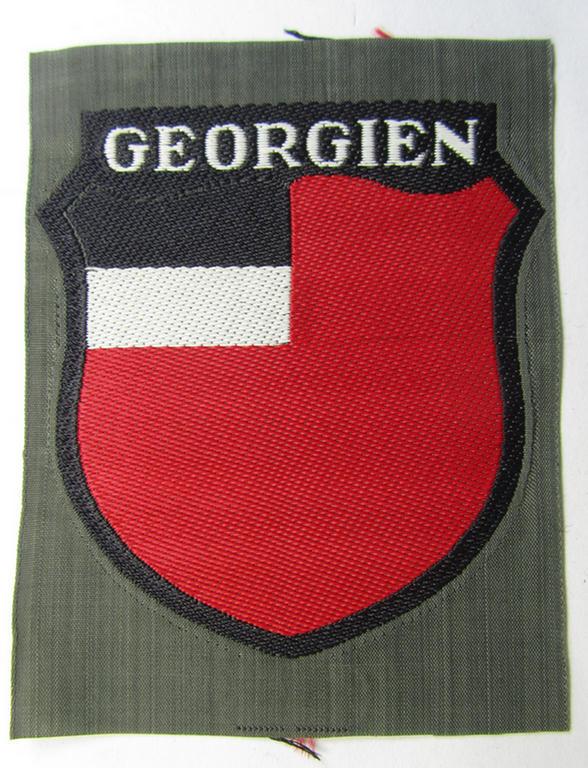 Superb, 'BeVo'-type armshield entitled: 'Georgien' (being a 'virtually mint- ie. unissued' example as intended for a volunteer who served within the 'Deutsche Wehrmacht' ie. within the 'Georgisches Legion')