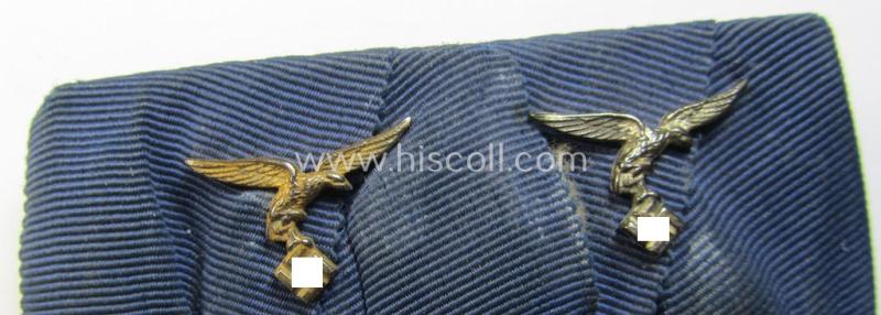 Attractive, two-pieced medal-bar (ie. 'Spange') showing two: WH (Luftwaffe) so-called: 'Dienstauszeichnungen für 4 u. 12 Jahre Treue Dienste' that both come period-mounted as a so-called: 'Doppelspange'