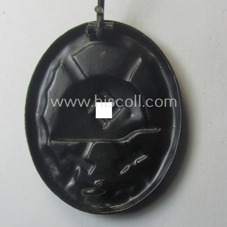 Hardly used- nor worn (ie. 'virtually mint- ie. unissued'!) example of a black-class wound-badge (or: 'Verwundeten-Abzeichen in Schwarz') being a typical non-magnetic and/or non-maker-marked example