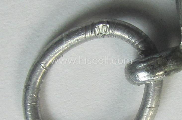 Atttractive, 'Luftschutz-Ehrenzeichen 2. Stufe' being a maker- (ie. '10'-) marked example as executed in zinc-based metal (ie. 'Feinzink') as was produced by the maker: 'Foerster & Barth'