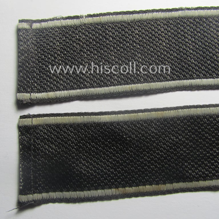 Waffen-SS, 1943/44 pattern cuff-title (ie. 'Ärmelstreifen') depicting the machine-woven Latin script text in silver-grey linnen as was intended for a member of the: 'SS-Regiment': "Westland" (ie. part of the: '5. SS-Pz-Gren.-Div. "Wiking")
