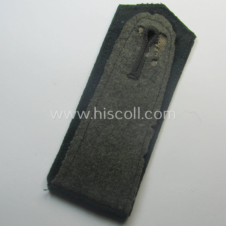 Single, WH (Heeres) EM-type 'cyphered' shoulderstrap: 'Soldat des Artillerie-Rgts. 99'