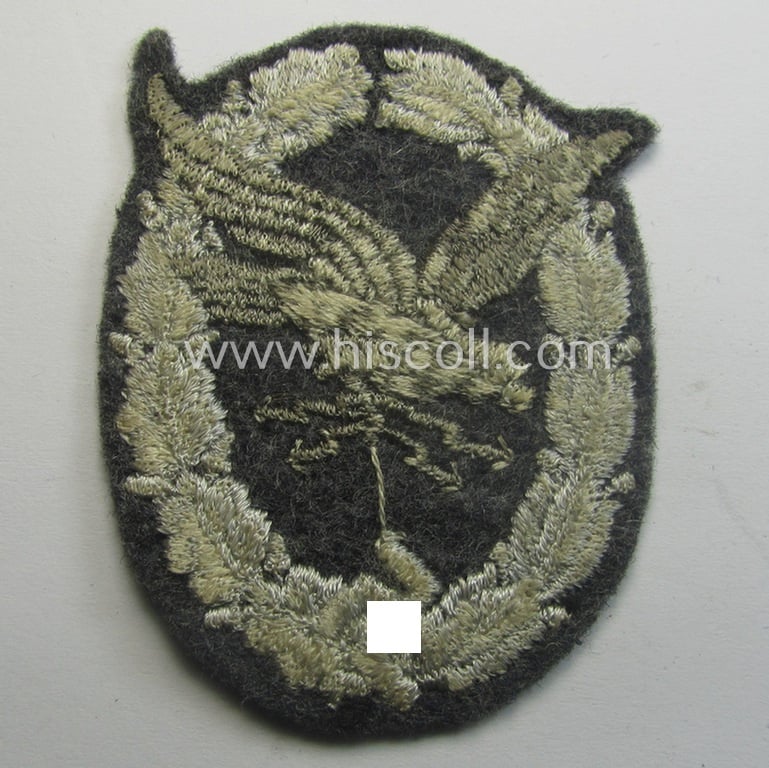 Truly used, WH (Luftwaffe): 'Fliegerschützen-Abz. mit Blitzbündel in Stoff' (or: cloth air-gunners-badge with lightning-bolts) being a nicely executed and typical machine-embroidered specimen