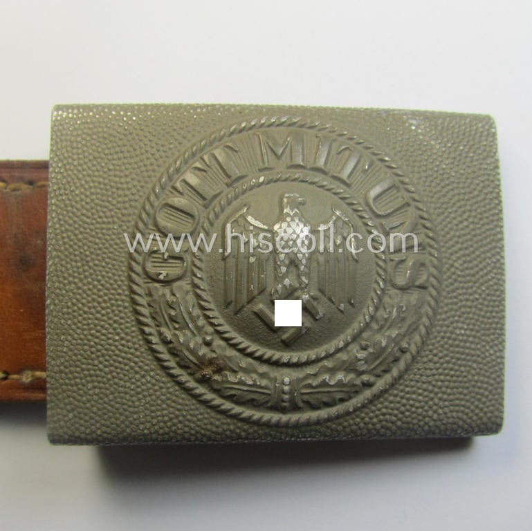 WH (Heeres) 'standard-pattern', field-grey-toned- and aluminium-based belt-buckle being a maker- (ie. 'R. Sieper & Söhne'-) marked- and/or: '1938'-dated example that comes mounted onto its leather-based tab