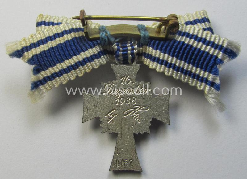 Miniature of an: 'Ehrenkreuz der deutschen Mutter - zweite Stufe' (or: silver-class mothers'-cross) being a neatly maker- (ie. 'L/60'-) marked example that comes in an overall nice- (albeit moderately worn- ie. used-), condition