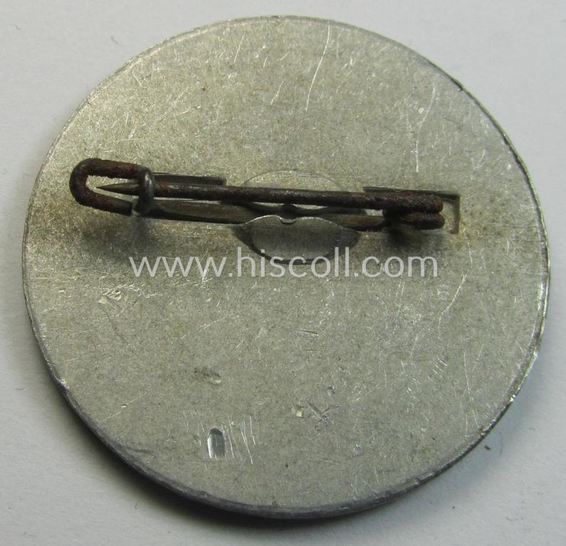 Silver-toned, W.H.W.- (ie. 'Winterhilfswerke'-) related day-badge (ie. 'tinnie') being a non-maker-marked example as was issued to commemorate the: 'WHW'-gathering ie. rally entitled: 'Tag der Wehrmacht - 19 März 1939'