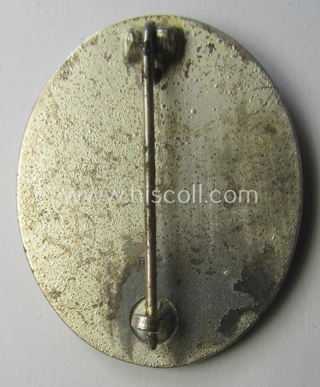 Minimally used- ie. worn, 'Verwundeten-Abzeichen in Silber' (or: silver-class wound-badge) being a neatly (dual!) maker- (ie. '100'- and/or: 'L55'- ) marked example as was produced by the: 'Rudolf Wächtler u. Lange'-company