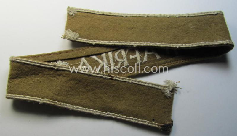 Attractive, WH (LW o. Heeres) cuff-title (ie. 'Ärmelstreifen') entitled: 'Afrika' (being a full-length example that comes in an issued-, used and/or carefully tunic-removed, condition)