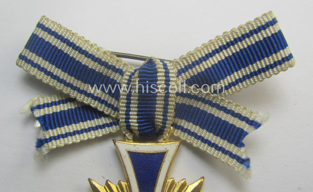 'Ehrenkreuz der deutschen Mutter - erste Stufe' (or: golden-class mothers'-cross) being a hardly used example that comes mounted onto its (unusually confectioned!) ribbon as issued and/or recently found