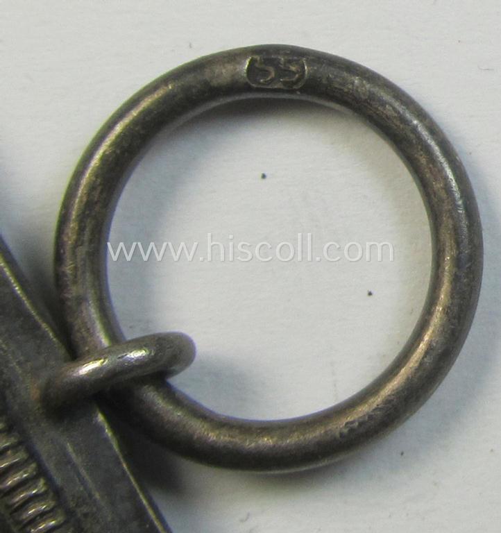 Attractive, 'Eisernes Kreuz II. Klasse' being a maker- (ie. '55'-) marked example that comes together with its original- and once-mounted ribbon (ie. 'Bandabschnitt') as was produced by the maker (ie. 'Hersteller'): 'J.E. Hammer & Söhne'