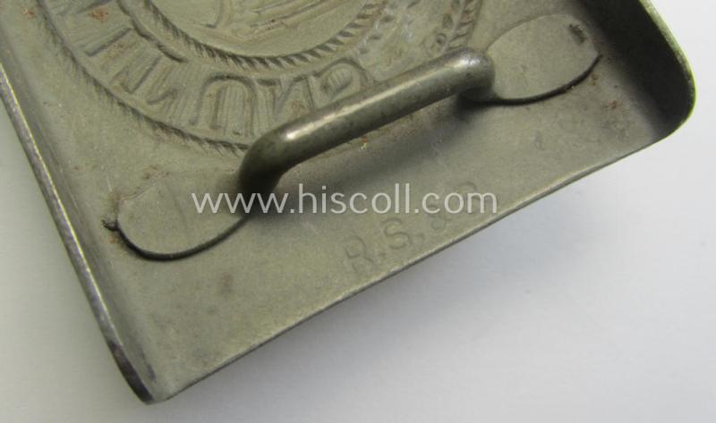 'Virtually mint', 'standard-issue'-pattern, WH (Heeres) field-grey-toned- and steel-based belt-buckle being a maker- (ie. 'R.S.&S.'-) marked example that comes mounted onto its 'R. Sieper u. Söhne'-marked and/or '1940'-dated tab
