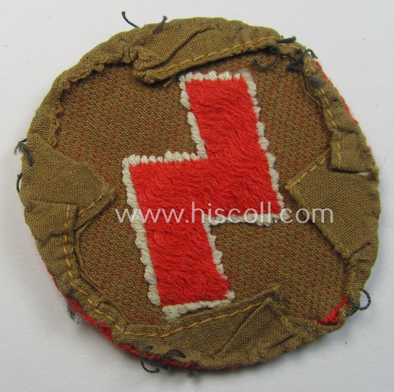 DJ (ie. 'Deutsches Jungvolk') arm-badge as was specifically intended for usage by a member who served within the: 'Oberbann 1' (being a moderately used- and carefully shirt-removed example that is void of an 'RzM'-etiket)