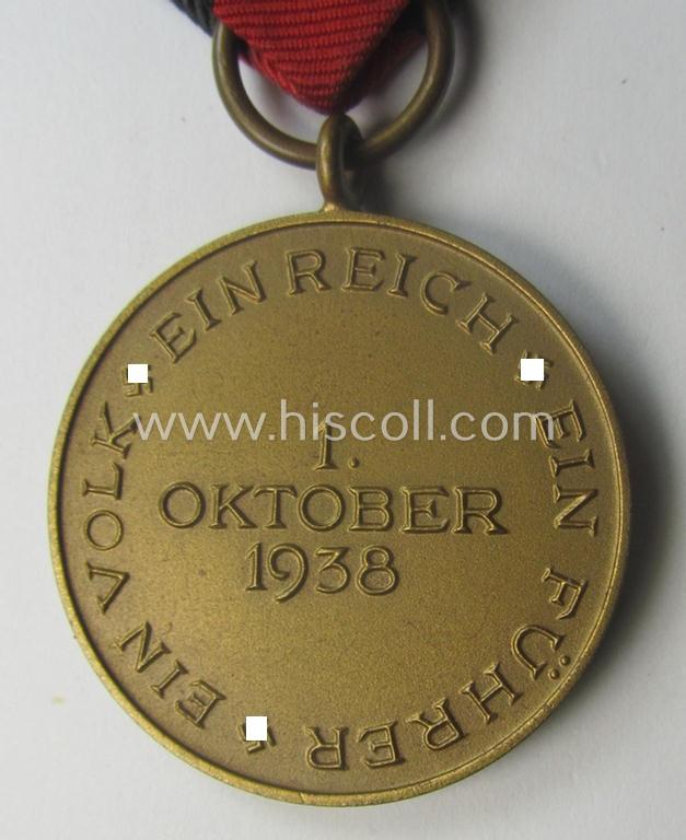 WH Czech-occupation- (ie. 'Anschluss'-) medal: '1. Oktober 1938' that comes with its period-attached 'PB-Spange' and that comes stored in its bordeaux-red-coloured- and/or non-maker-marked etui