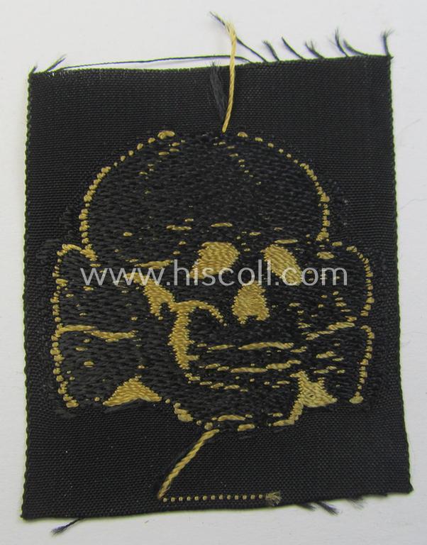 Attractive - and 'virtually mint- ie. unissued'! - example of a Waffen-SS cap-skull (being of the larger-sized model as was executed in neat 'BeVo'-weave pattern and being of the 'tropical'-version- ie. being a golden-yellow-coloured example)