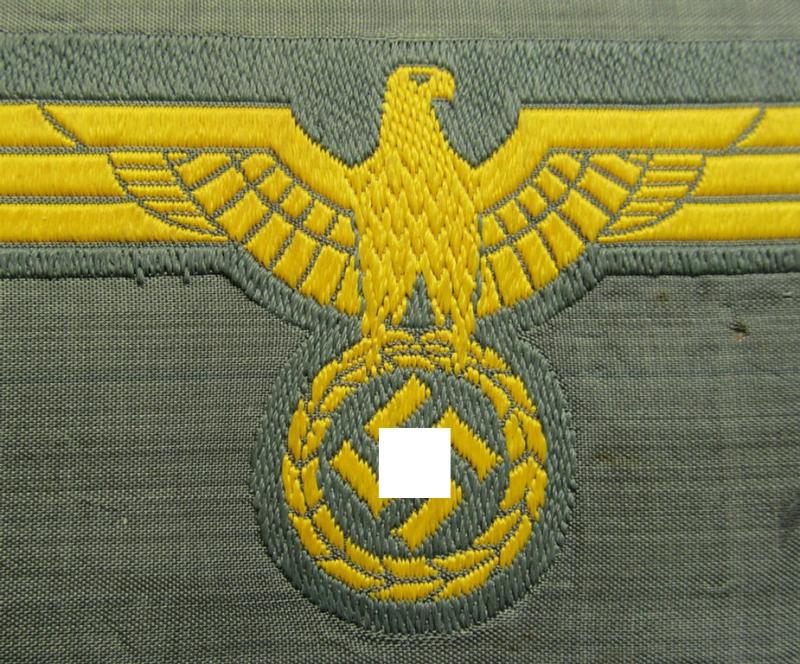 WH (Kriegsmarine) ie. 'Küsten-Art.'-related breast-eagle (ie. 'Brustadler für Mannschaften u. Uffz. der Küsten-Artillerie-Truppen') being a 'standard-pattern-example as executed in the 'BeVo'-weave-pattern on a field-grey-coloured background