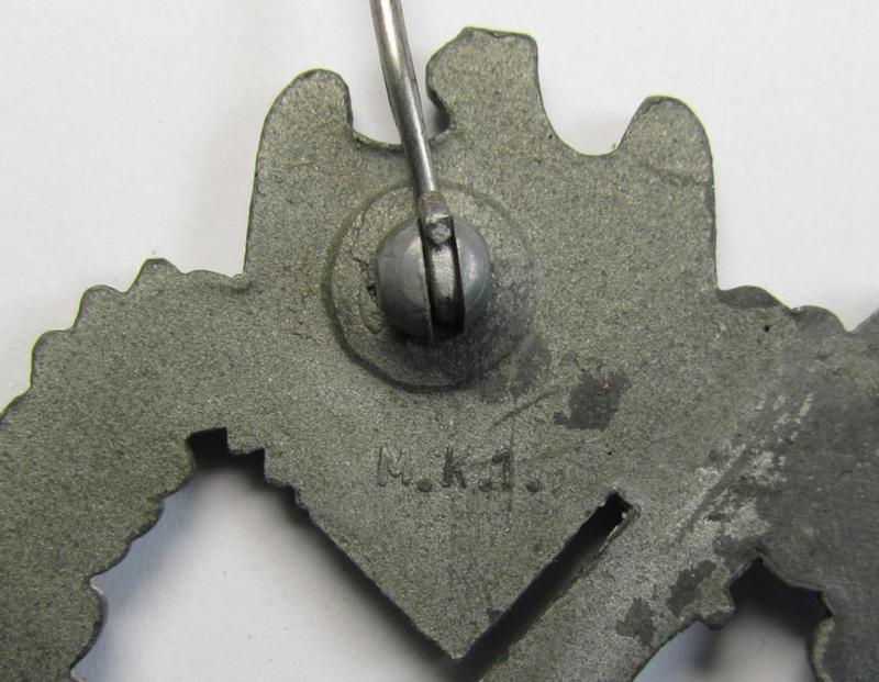 Attractive - and moderately used! - 'Infanterie-Sturmabzeichen in Silber' (or: silver-class infantry-assault badge ie. IAB) being a neatly maker- (ie. 'MK 1'- or: 'Metall u. Kunststoff'-) marked example as executed in silverish-coloured 'Feinz...