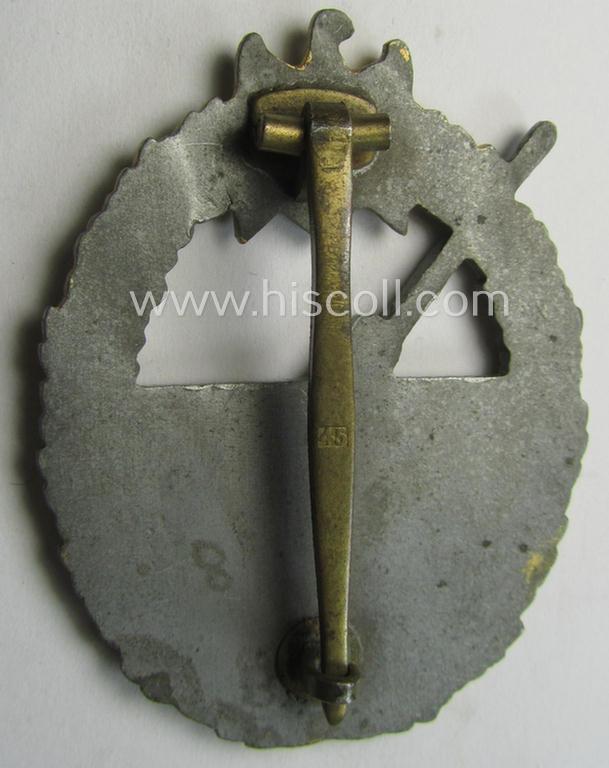 WH (KM) 'Marine-Artillerie-Abzeichen' being a maker- (ie. '45'-) marked- and/or zinc- (ie. 'Feinzink'-) based example by the: 'Franz Jungwirth'-company