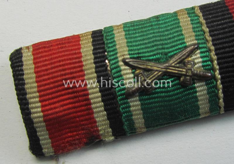 Four-pieced - and unusually found! - WH (Heeres) ribbon-bar (ie. 'Band- o. Feldspange') showing resp. the ribbons for an: 'EKII.Kl.', an: 'Ostvölker Tapferkeits-Med. mit S.', a: Czech 'Anschluss'-medal and a: 'Deutsche Olympia-E.medaille 193...