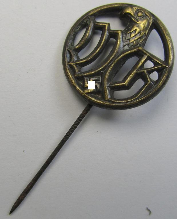 Attractive - and actually scarcely encountered! - WH-related lapel-pin (ie. 'Brosche') as was specifically intended for a: 'Wehrmachtsgefolge' (being a nicely preserved example that comes mounted onto its longer-sized pin)