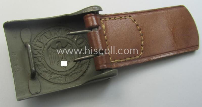 'Virtually mint', 'standard-issue'-pattern, WH (Heeres) field-grey-toned- and steel-based belt-buckle being a maker- (ie. 'R.S.&S.'-) marked example that comes mounted onto its 'R. Sieper u. Söhne'-marked and/or '1940'-dated tab