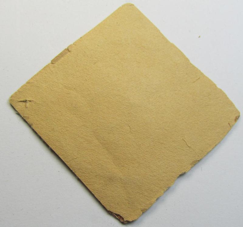 Unusually seen, multi-coloured (and nicely woven!) patriotic badge (ie. 'N.S.D.A.P.-supportive piece) being an example that shows a black-coloured swastika mounted onto a white- and black-coloured 'backing'