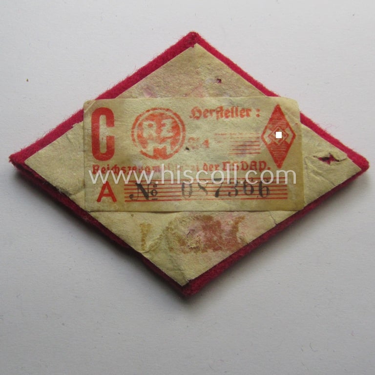 Superb - and rarely found! - neatly hand-embroidered, HJ (ie. 'Hitlerjugend') arm-badge as was specifically intended for usage by an: 'HJ-Adjutant' (still retaining its 'RzM'-etiket)