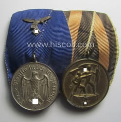 WH (LW) medal-bar (ie.: 'Doppelspange') resp. showing a:...