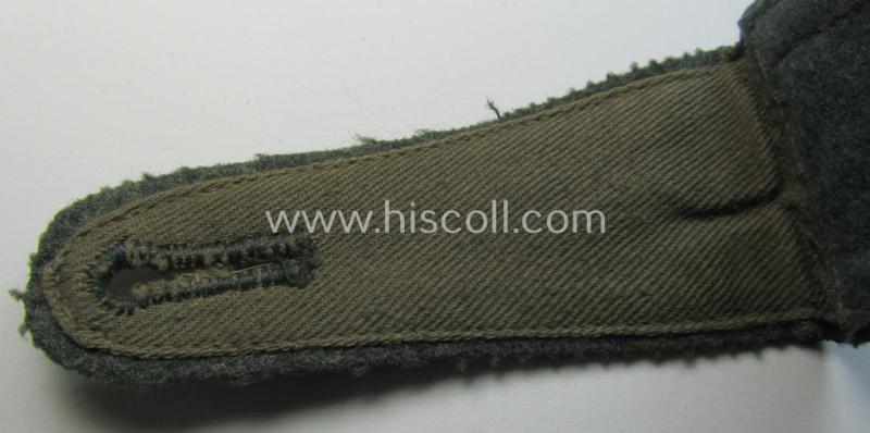 Single - and actually not that often seen! - WH (Heeres) NCO-type (ie. 'M36-/M40'-pattern- and 'pointed styled-') 'cyphered' shoulderstrap as was intended for usage by an: 'Unteroffizier des Artillerie-Regiments 67'