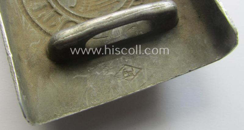 WH (Heeres) 'standard-pattern', field-grey-toned- and aluminium-based belt-buckle being a maker- (ie. 'Paulmann & Crone'-) marked- and/or: '1938'-dated example that comes mounted onto its leather-based tab