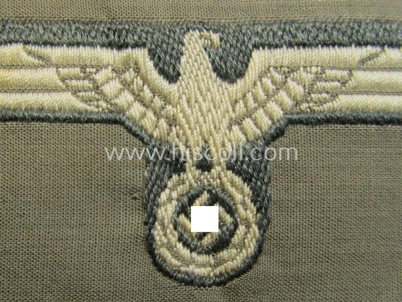 Attractive, WH (Heeres) - very early- ie. pre-war-period! - white-coloured side-cap-eagle (ie. 'Schiffchenadler für Mannschaften u. Uffz.') as was executed in the neat 'BeVo'-weave pattern on a greyish- ie. bluish-green-coloured background