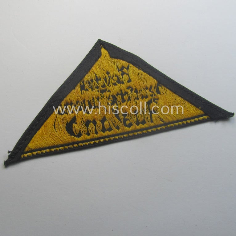 'HJ' ('Hitlerjugend') district-triangle (ie. 'Gebietsdreieck') entitled: 'Reichs-deutsche Jugend Ausland' being an (I deem) minimally worn- ie. used specimen that misses its 'RzM'-etiket