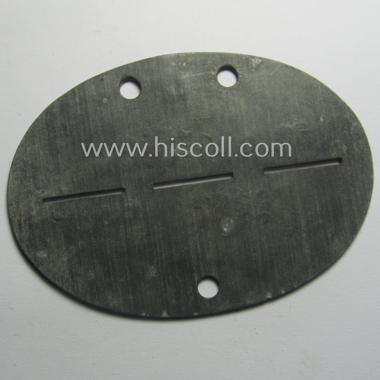 Zinc-based, WH (Heeres-) ie. 'Panzer'-related ID-disc (ie. 'Erkennungsmarke') bearing the clearly stamped unit-designation that reads: 'Pz.Ers.Abt. 5 - Stammkp. Nr. 12682' and that comes as issued and/or worn