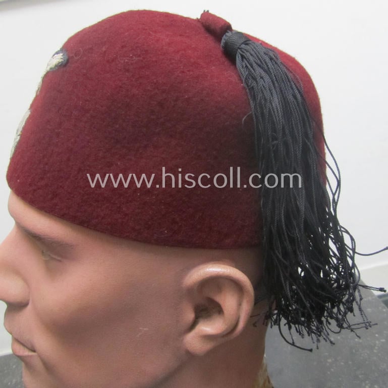Maroon-red-coloured, Waffen-SS-pattern so-called: 'Fez' having a neat - and fully matching! - silver-grey-coloured- and/or 'BeVo'-woven insignia-set originally- (ie. 'off-factory'-) attached