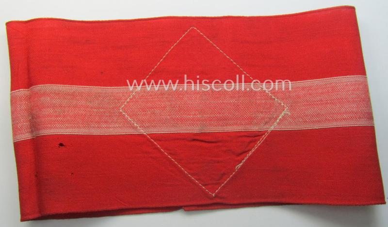 'Standard-issued'-pattern (ie. entirely woven) pattern, bright-red-coloured HJ- (ie. 'Hitlerjugend'-) related armband (ie. 'Armbinde') being a moderately worn- ie. used example that misses its 'RzM'-etiket