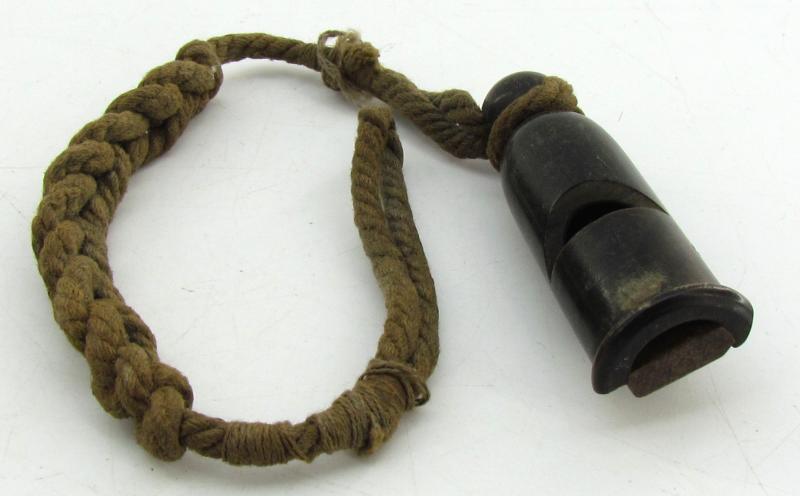 Wehrmacht issue signal whistle with lanyard