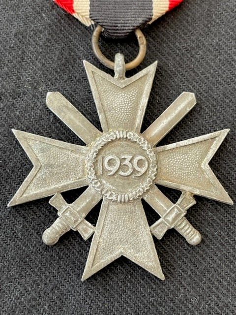 GERMAN WWII WAR MERIT CROSS 2nd CLASS WITH SWORDS NUMBERED RING 45 PRODUCED BY JULIUS BAUER SOHNE.