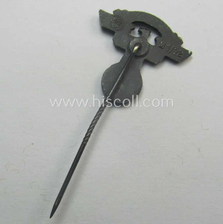 Silver-toned - and 'Feinzink'-based - lapel-pin (ie. 'Zivilabzeichen') being a maker- (ie. 'RzM M1/72'-) marked example to be worn on the civil attire by the various staff-members of the N.S.K.K. (ie. 'National Soc. Kraftfahr Korps')