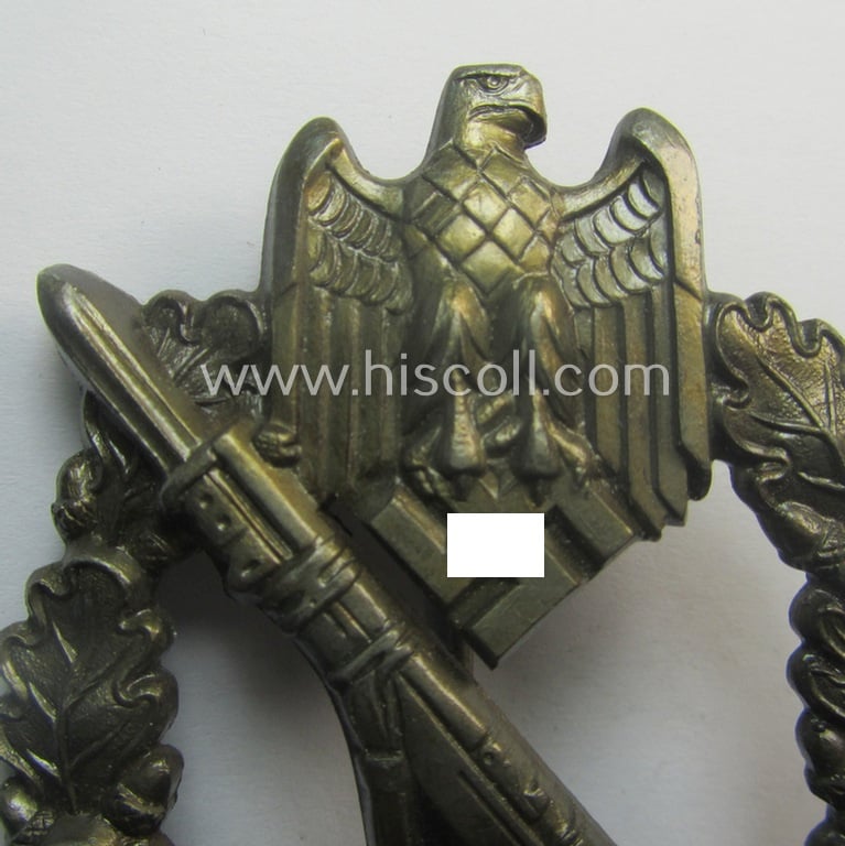 Superb - and very detailed! - 'Infanterie Sturmabzeichen in Bronze' (or: bronze-class infantry assault-badge ie. IAB) being a maker- (ie. 'S.H.u.C.o. 41'-) marked example as executed in bronze-toned, zinc-based metal (ie. 'Feinzink')